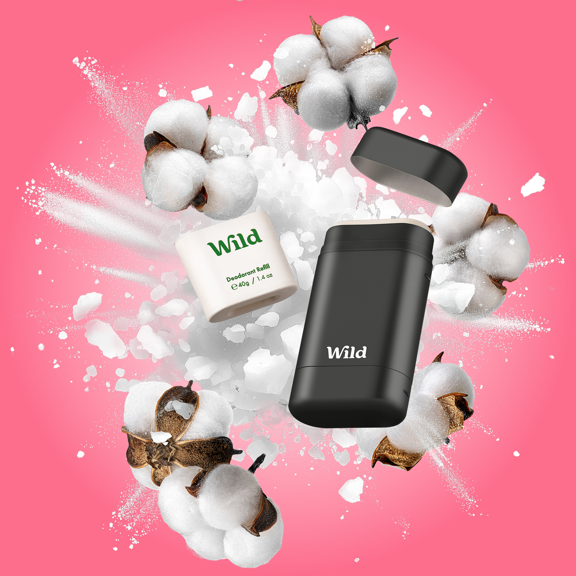 Caption: a pink background with cotton and a black and white soap dispenser