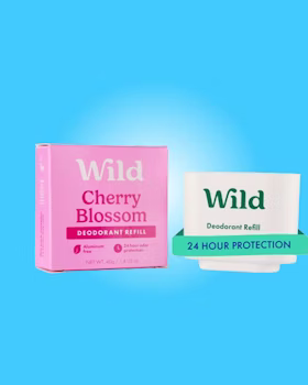 Caption: a box of wild cherry blossom next to a box of deodorant stick