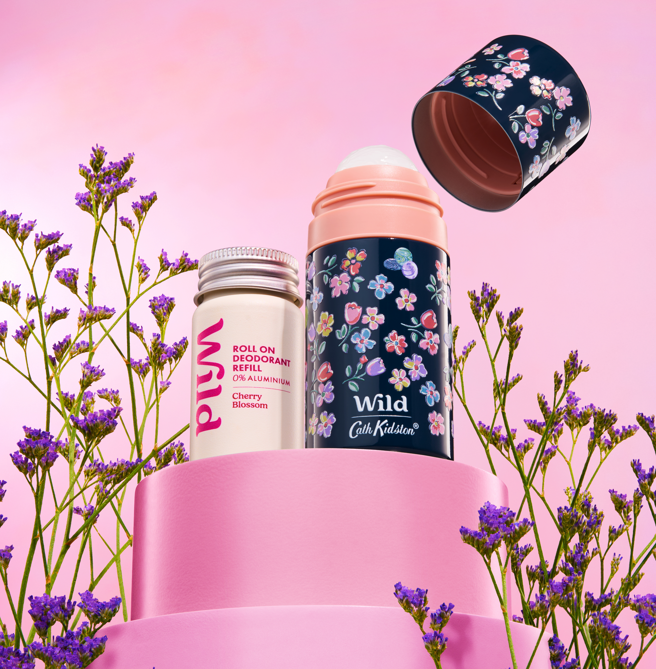 Caption: a couple of bottles that are next to some flowers