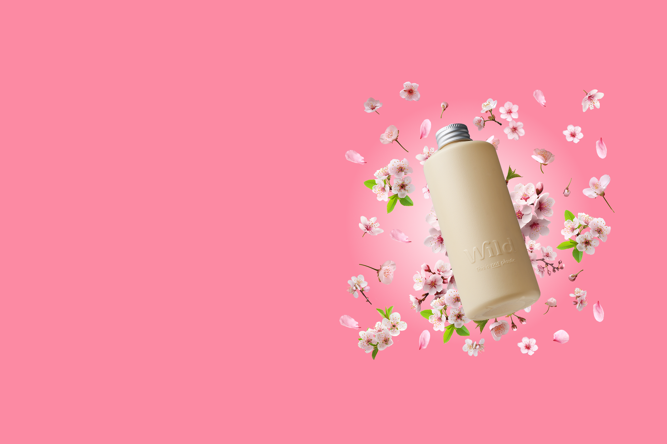 Bijschrift: een roze achtergrond met bloemen en een fles