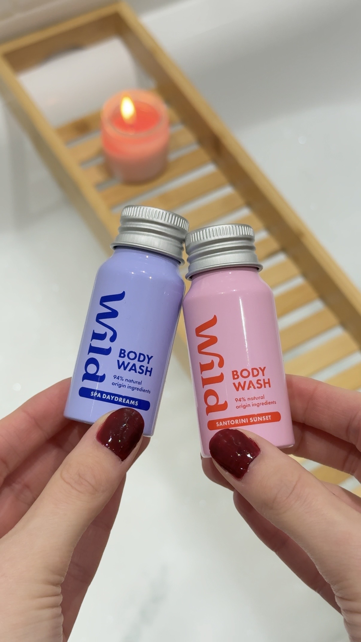 Caption: two bottles of body wash sitting next to each other