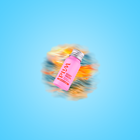 Caption: a pink bottle with a red cap on a blue background