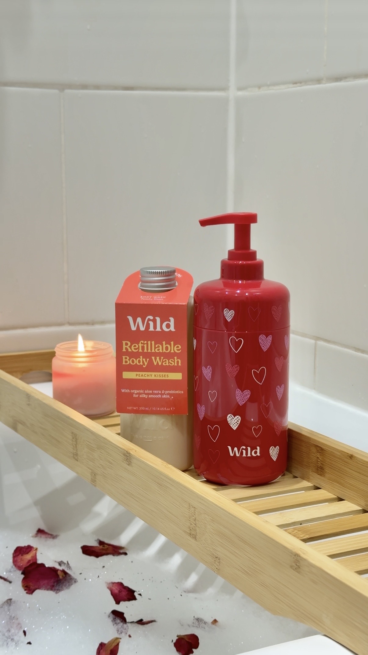 Caption: a bottle of soap and a soap dispenser on a wooden shelf