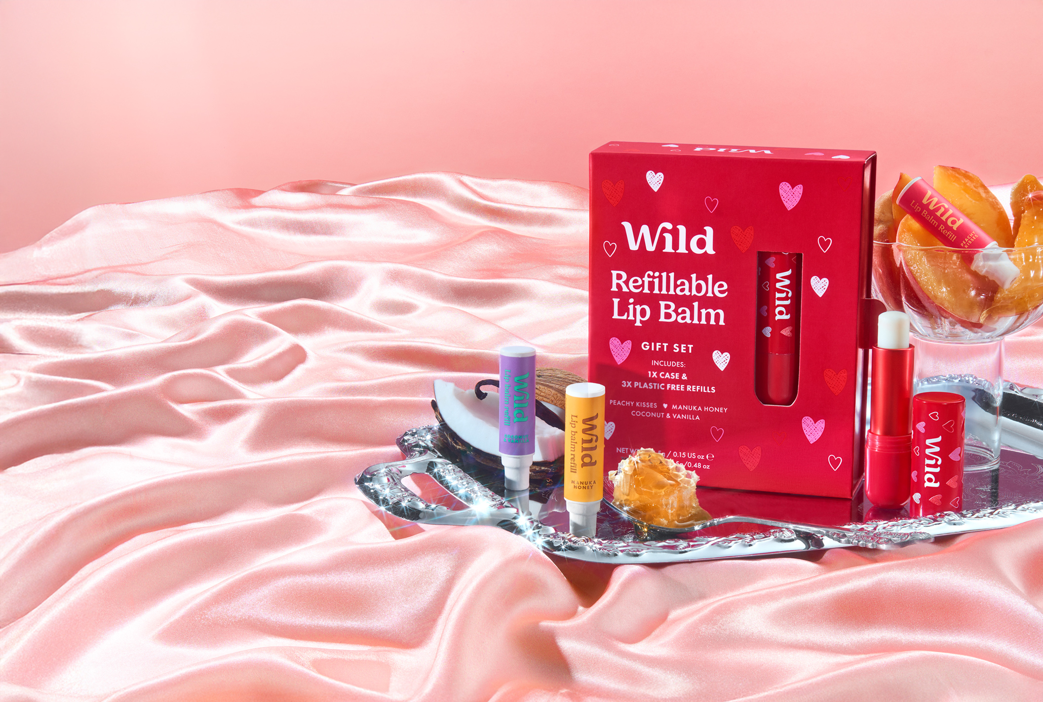 Caption: a couple of bottles of lip balm on a tray