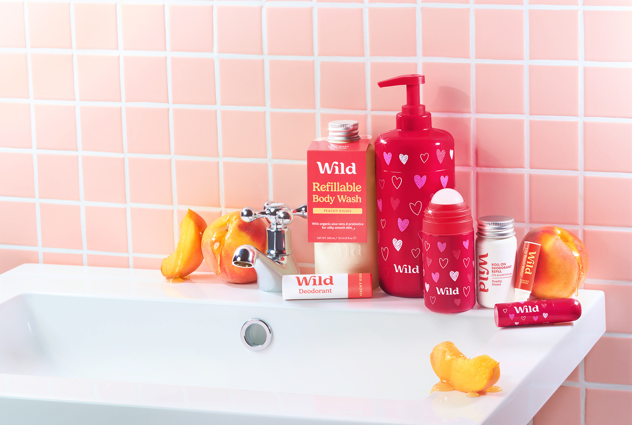 Caption: a bathroom sink with a lotion bottle, soap, and lotion