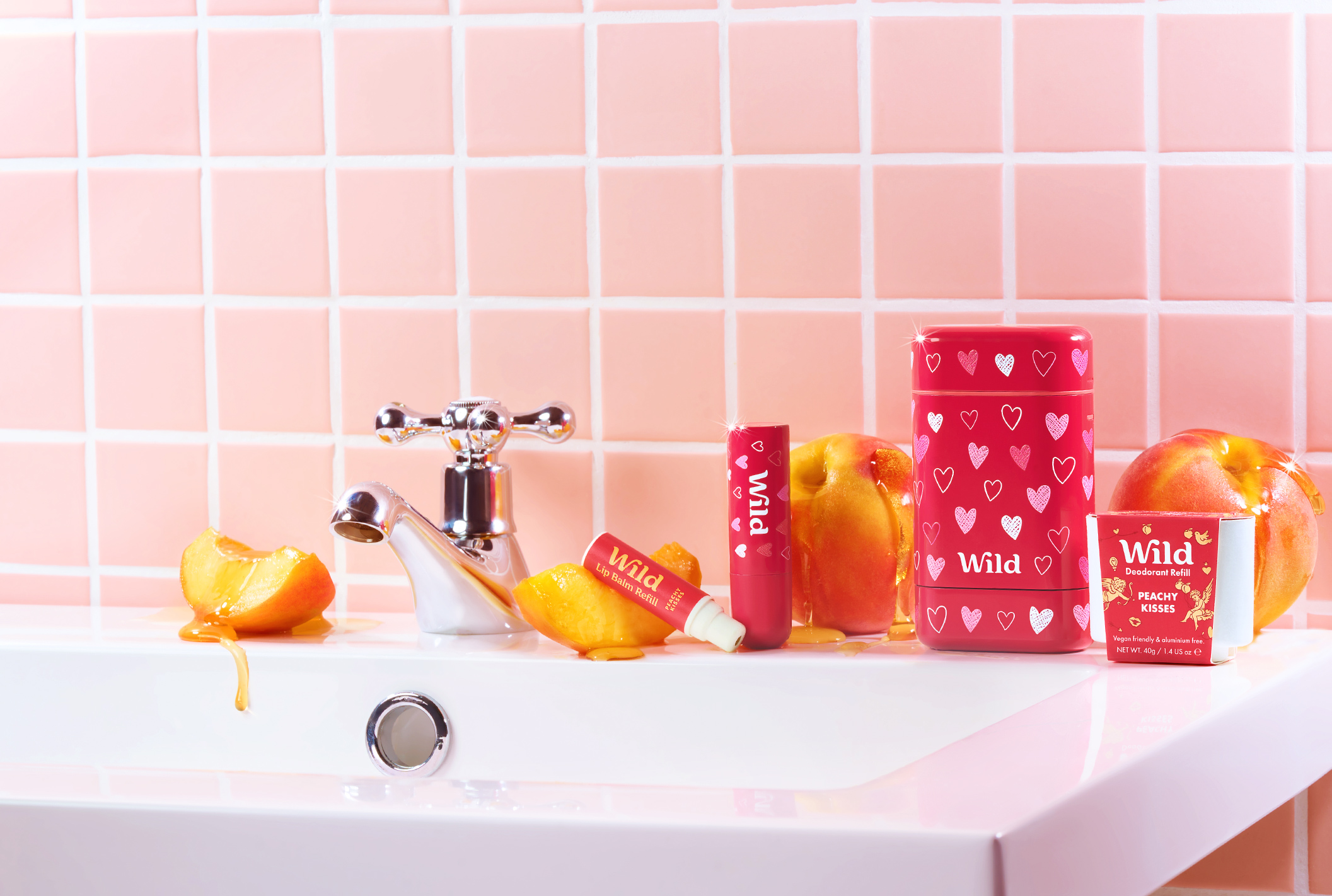Caption: a bathroom sink with a couple of soaps on it