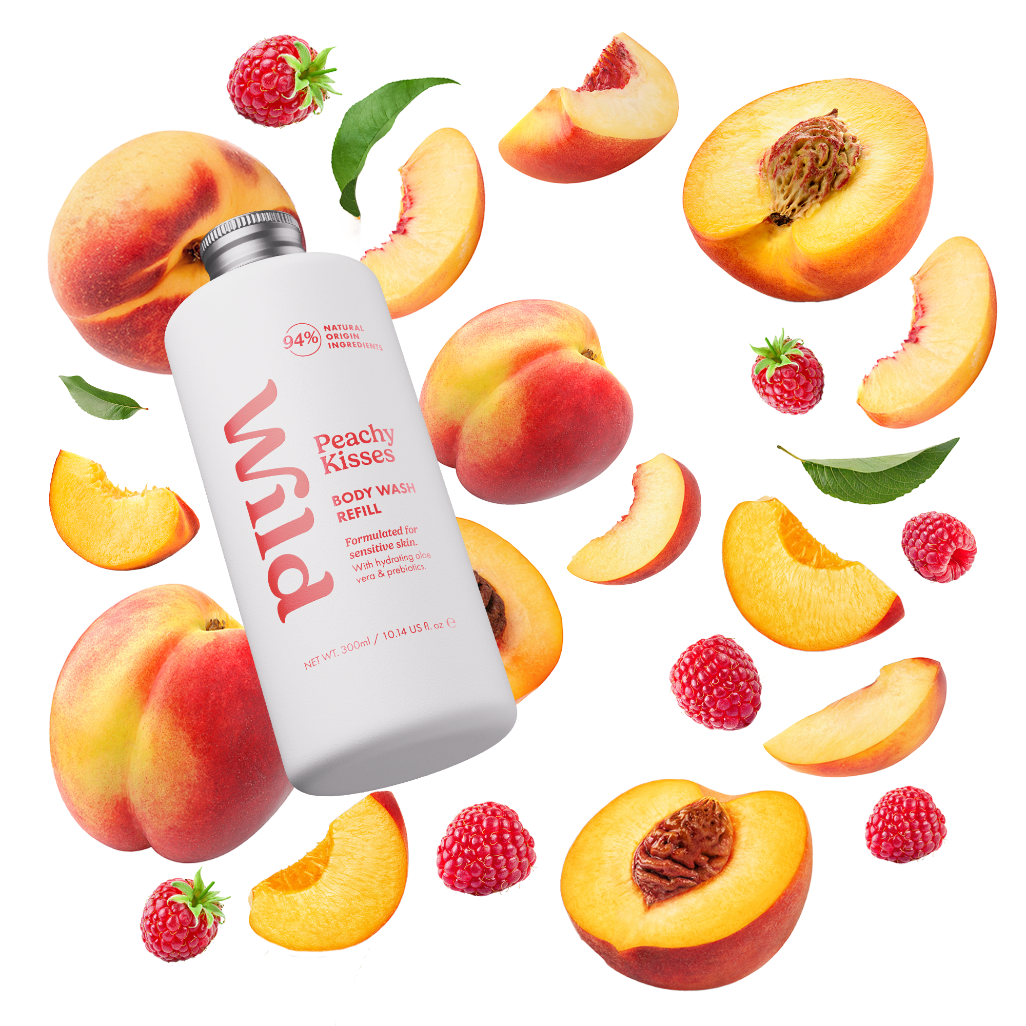 Caption: a bottle of vitamin water surrounded by peaches and raspberries