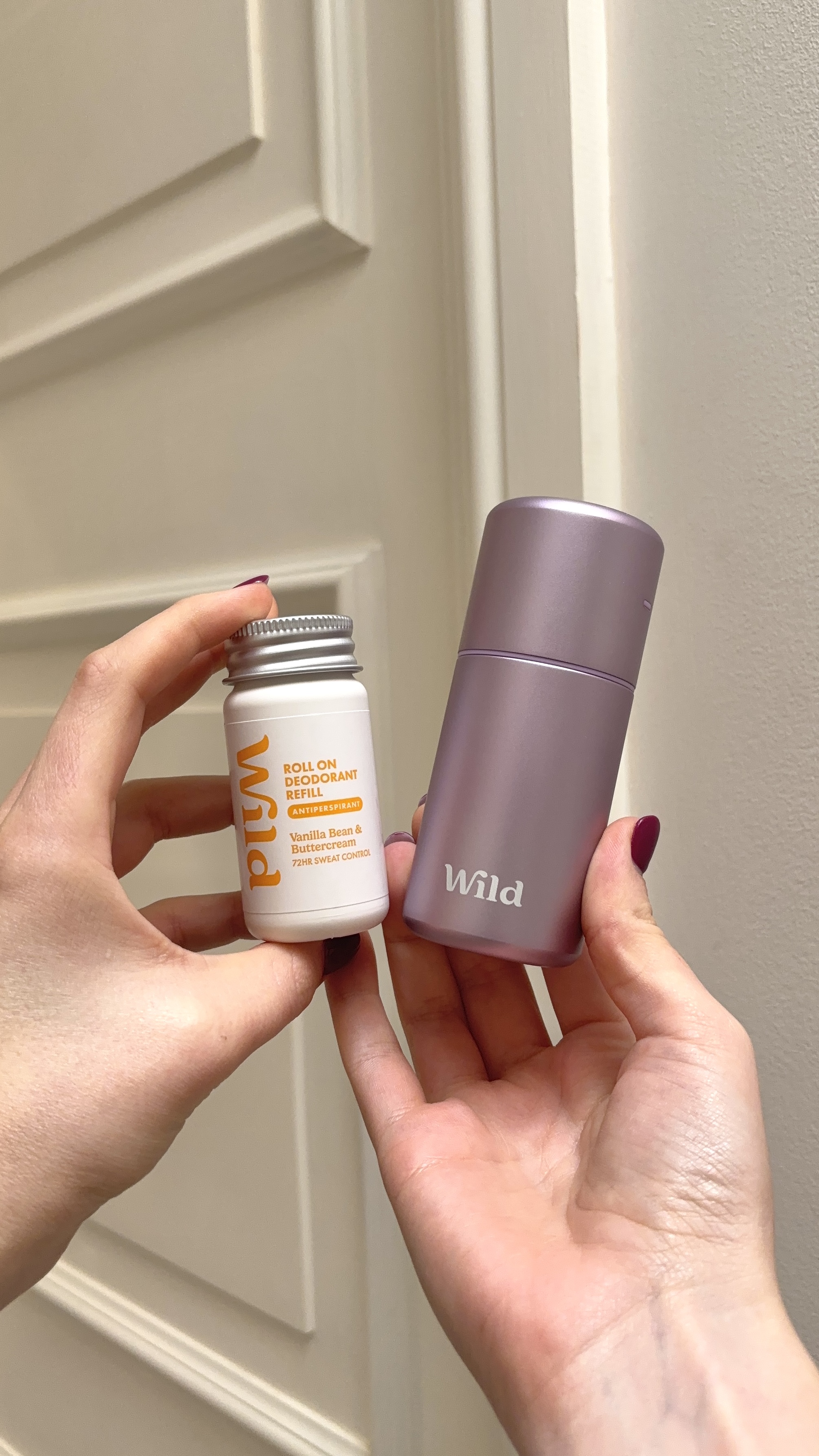 Caption: a woman holding a bottle of vitamins next to a bottle of deodoran