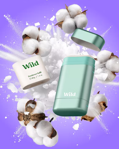 Bijschrift: een fles wild naast een bos katoen