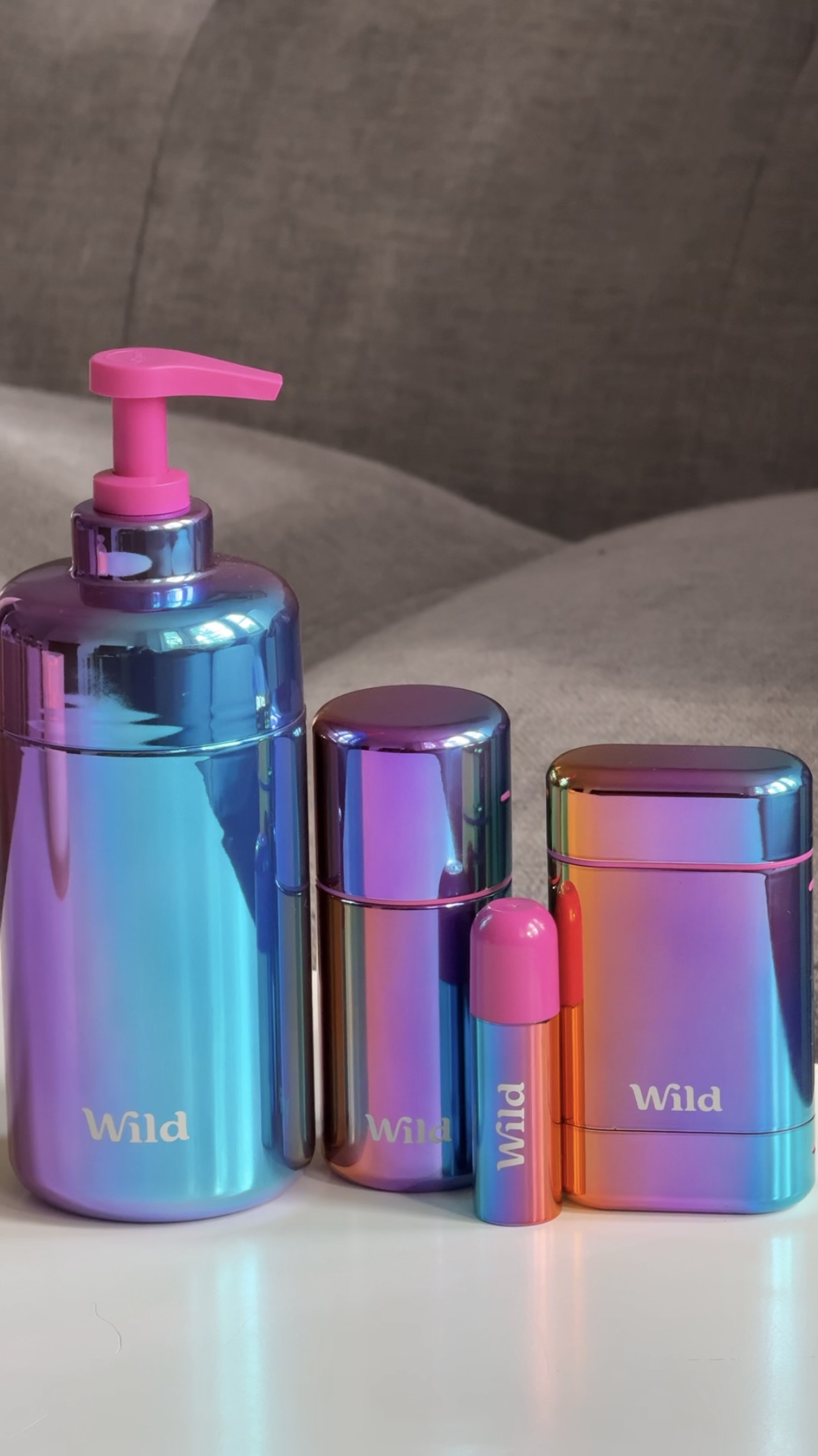 Caption: a bathroom set with a soap dispenser, soap dispenser