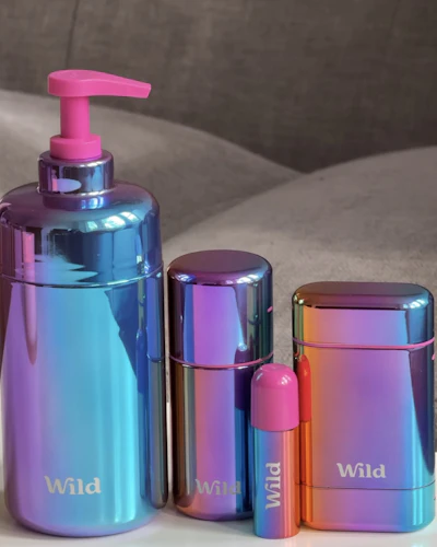 Caption: a bathroom set with a soap dispenser, soap dispenser