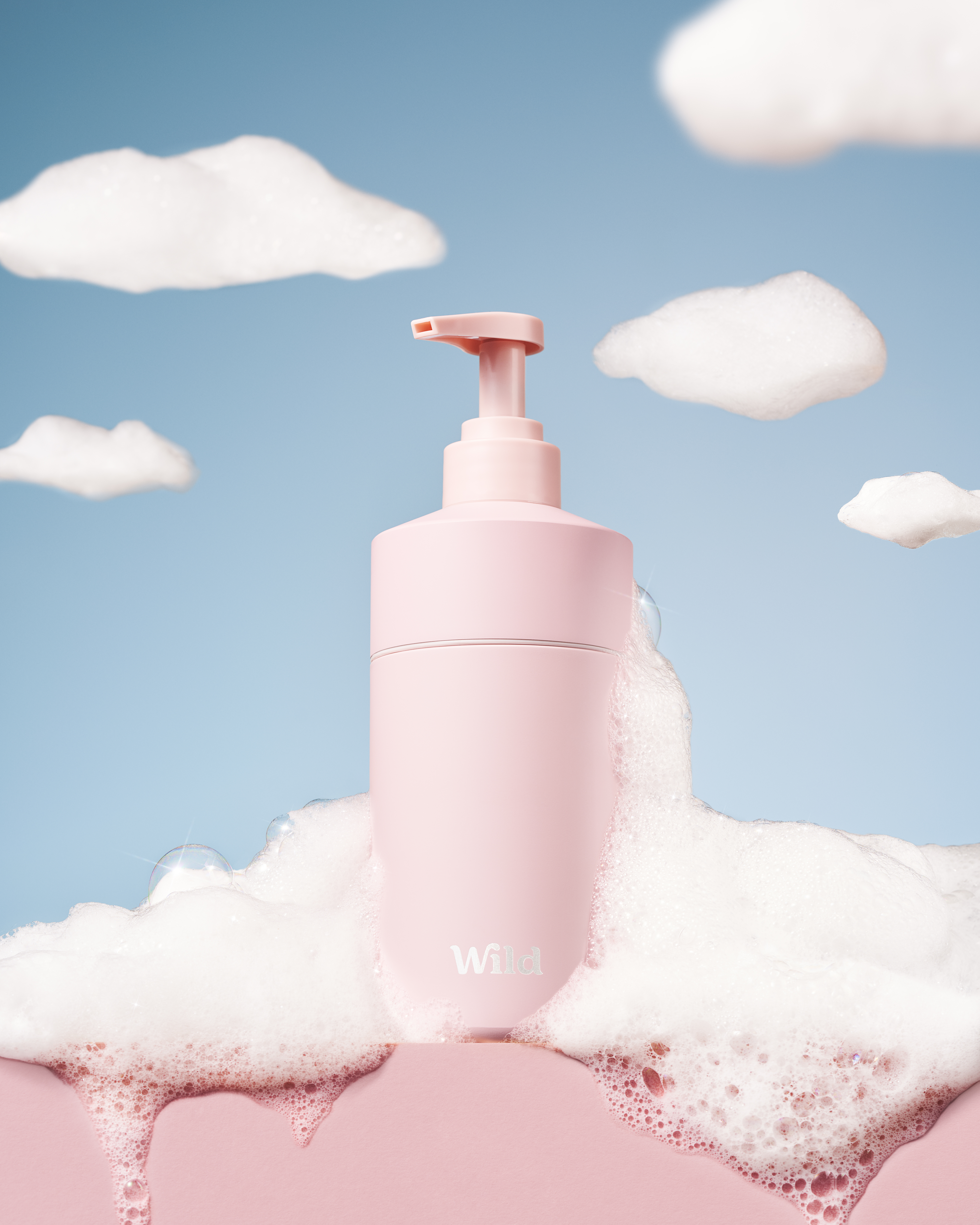 Caption: a bottle of foam sitting on top of a cloud