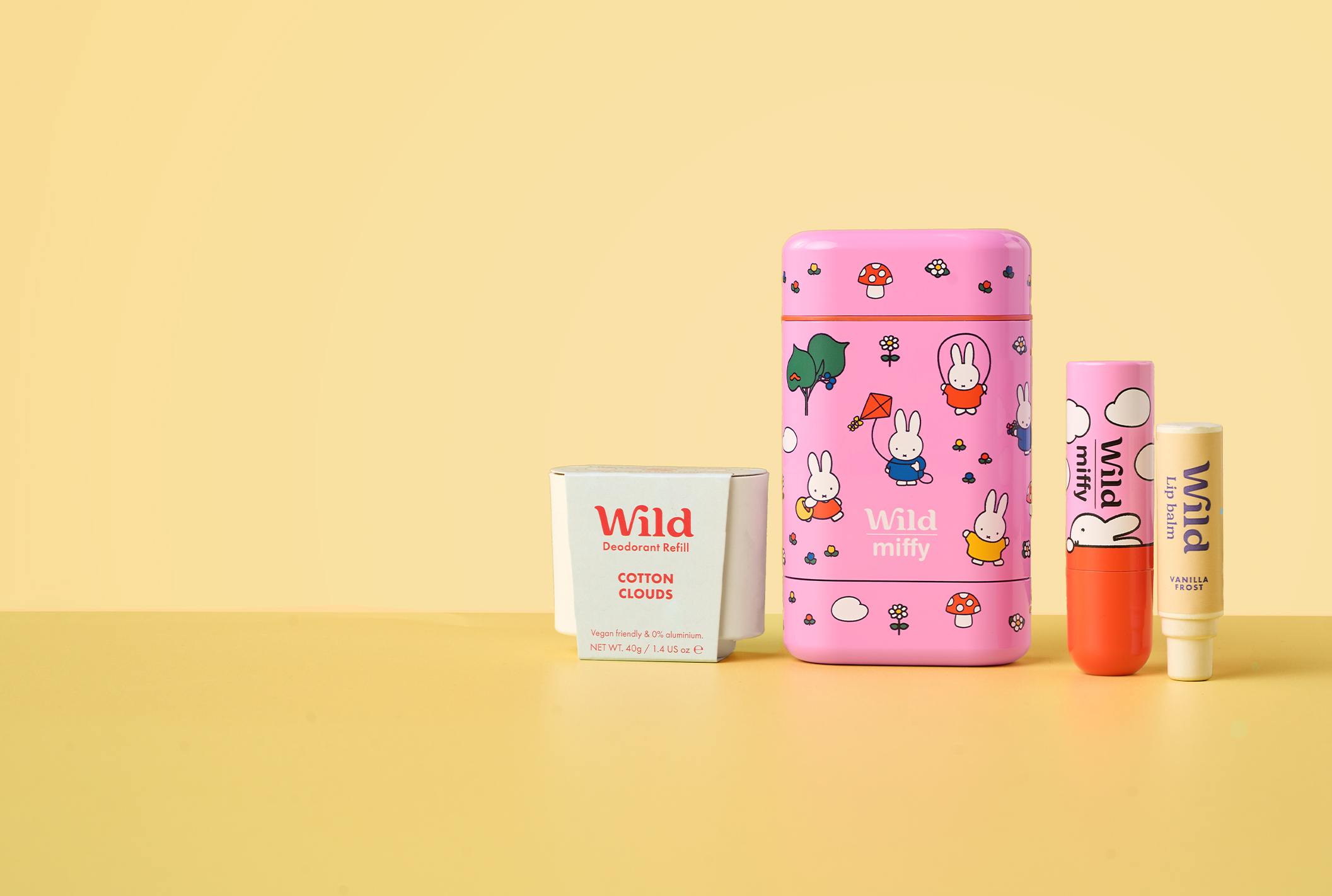 Caption: a pink container with a lip bale next to it