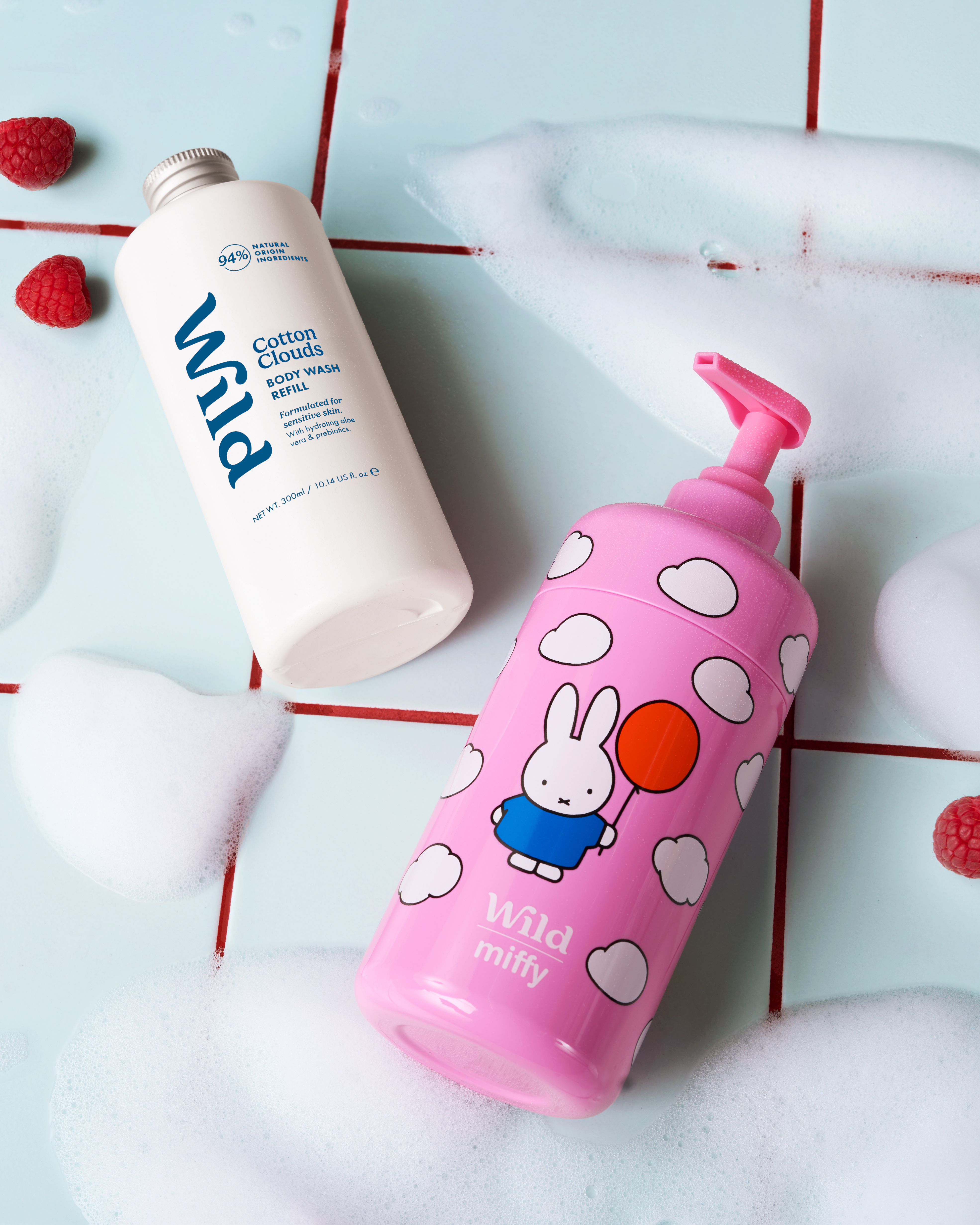 Caption: a bottle of toothpaste and a bottle of mouthwash on a tiled floor
