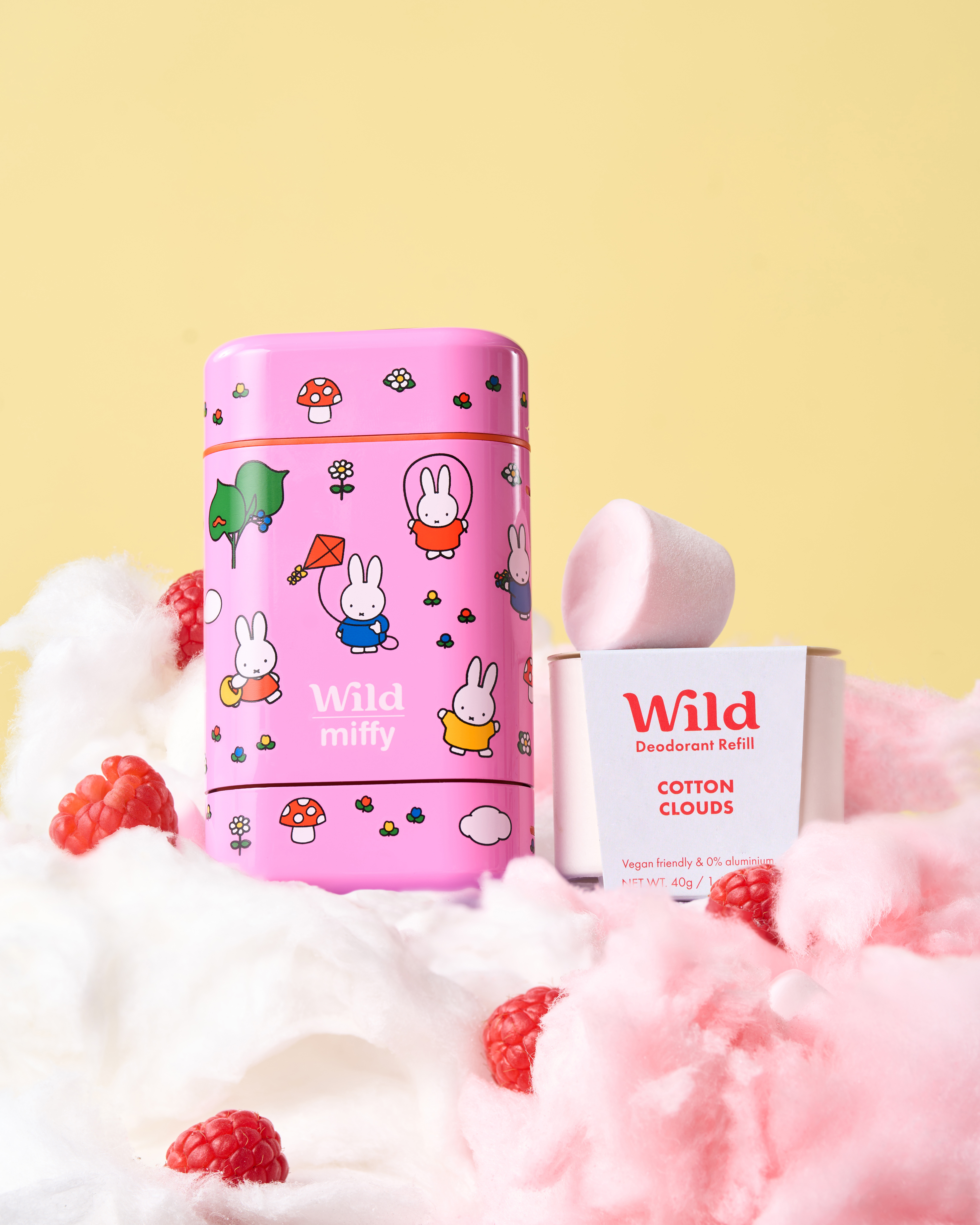 Caption: a pink tin with a bunny on it next to a box of soap