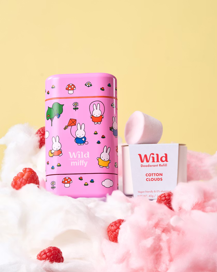 Caption: a pink tin with a bunny on it next to a box of soap