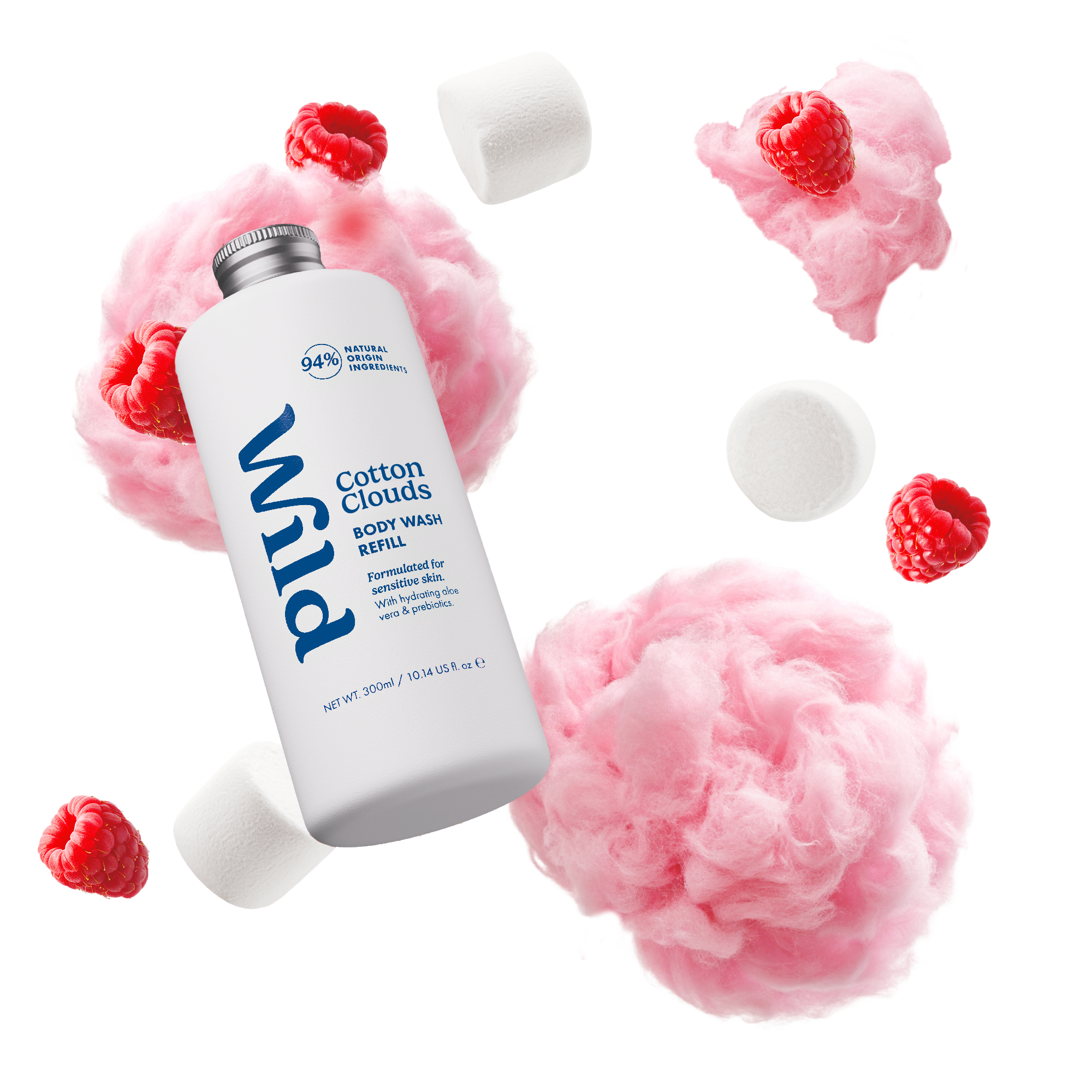 Caption: a bottle of lotion surrounded by raspberries and marshmallows