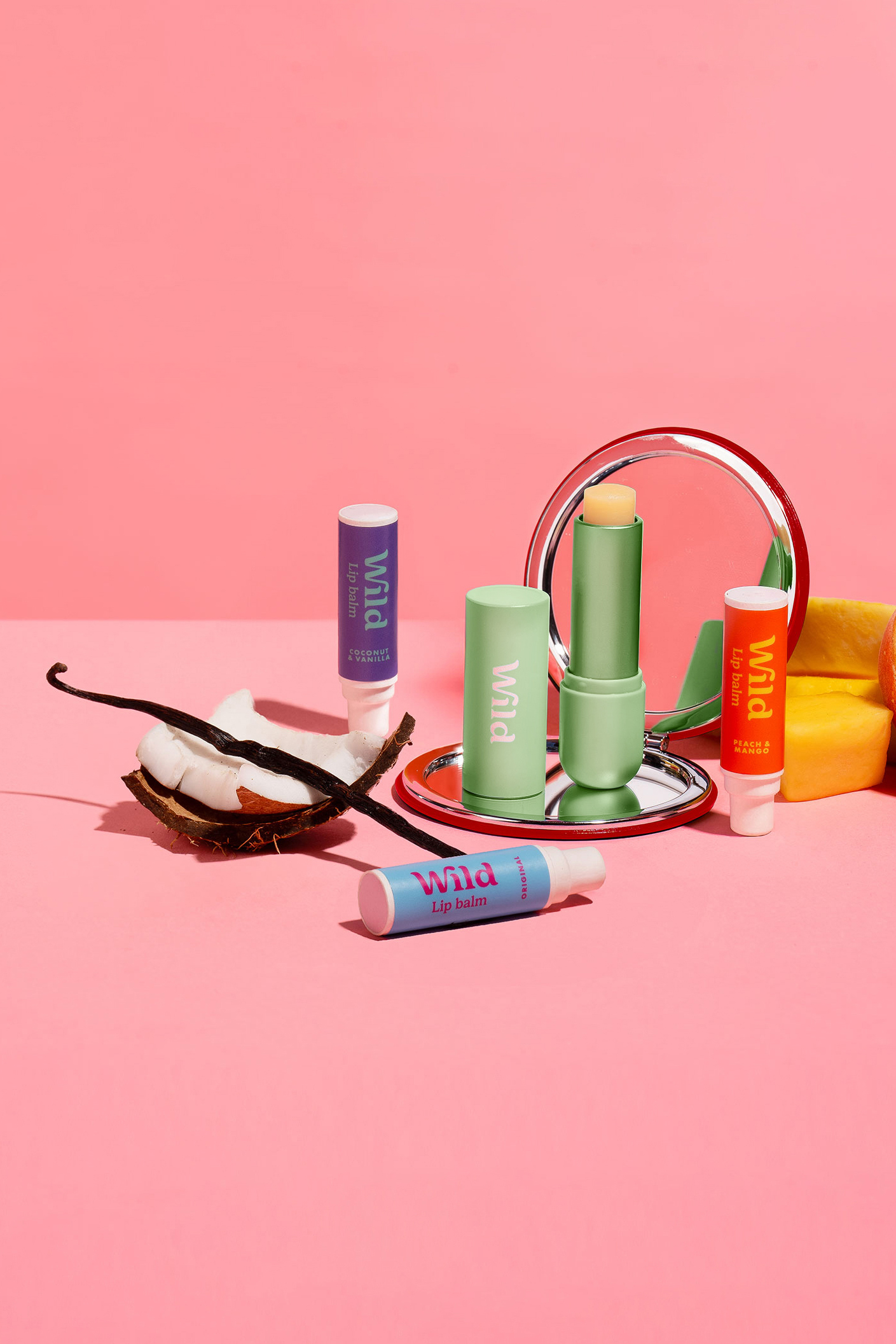 Caption: a pink background with various items on a plate
