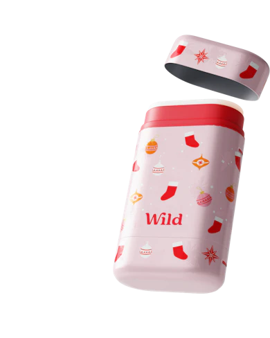 Caption: a pink and red canister with a red lid