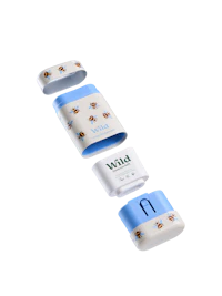 Caption: a bottle of baby wipes and a bottle of baby wipes