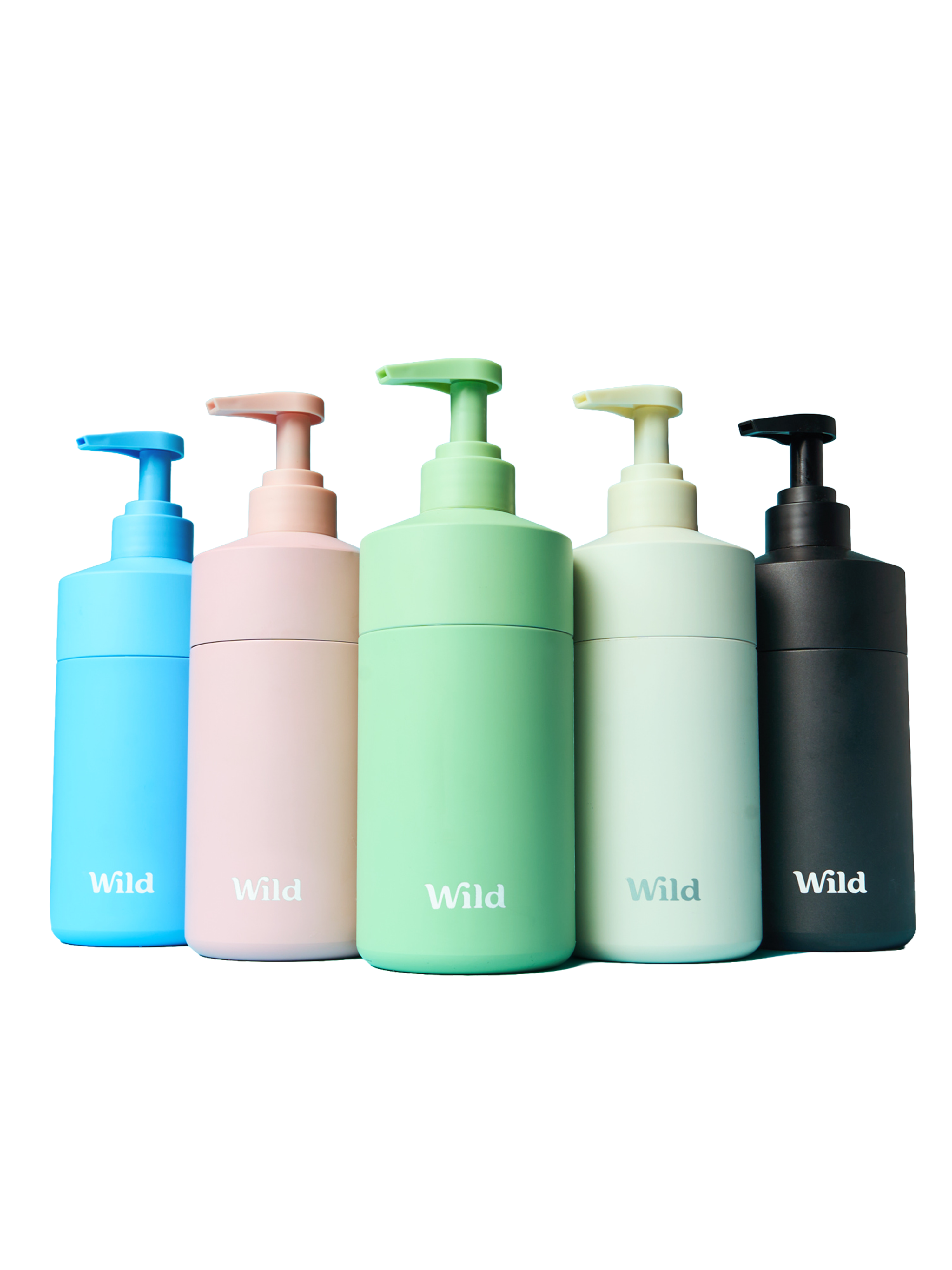 Caption: a set of four different colored bottles