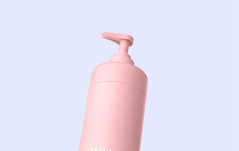 Bildunterschrift: Eine rosa Flasche mit einer Pumpe oben drauf