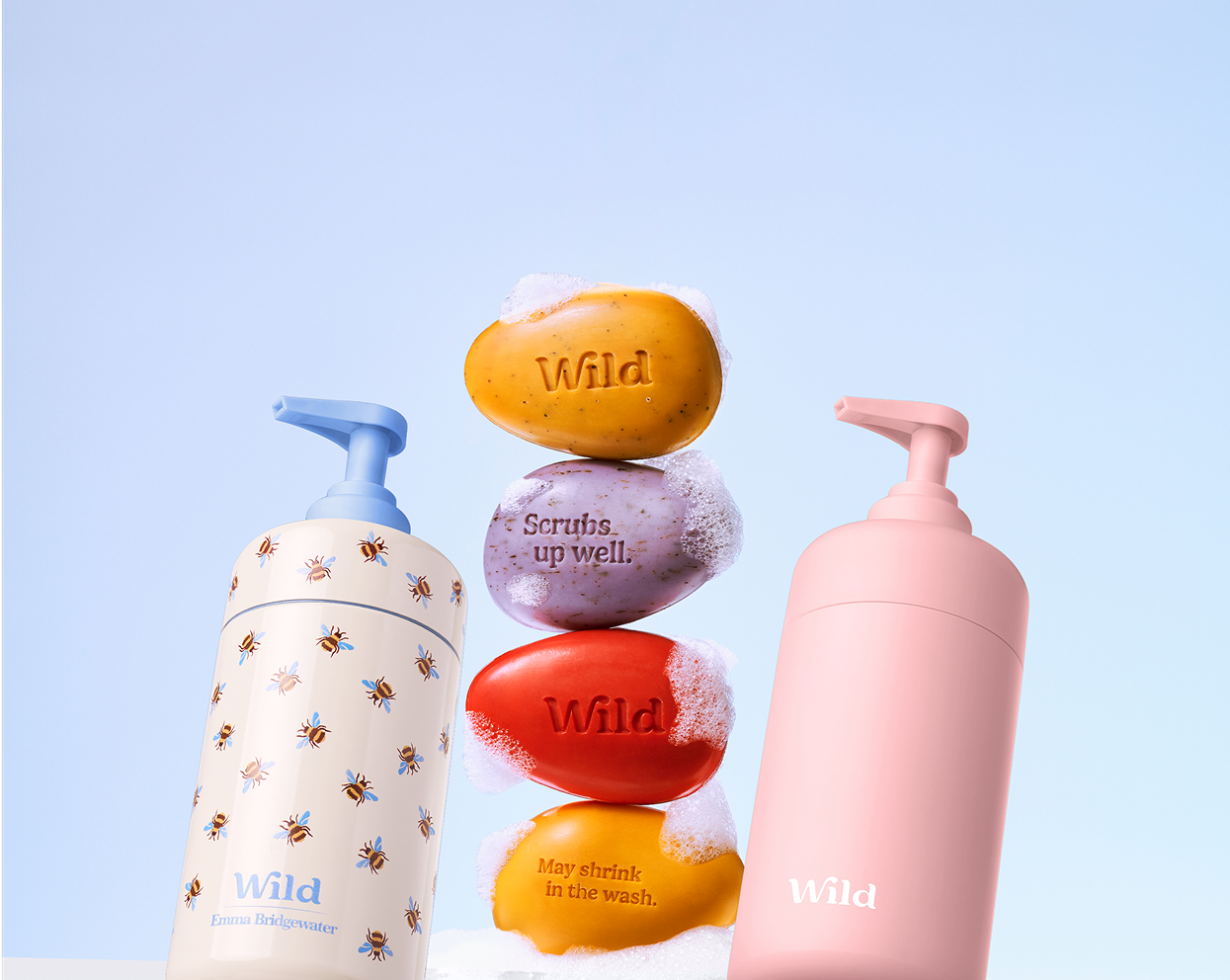 Caption: a bottle of water, a bottle of soap, a bottle of soap and a