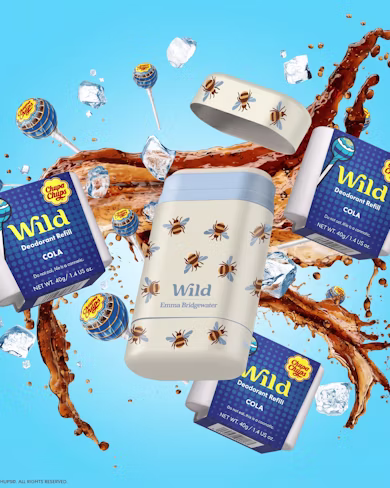 Caption: a bottle of wild is surrounded by other items