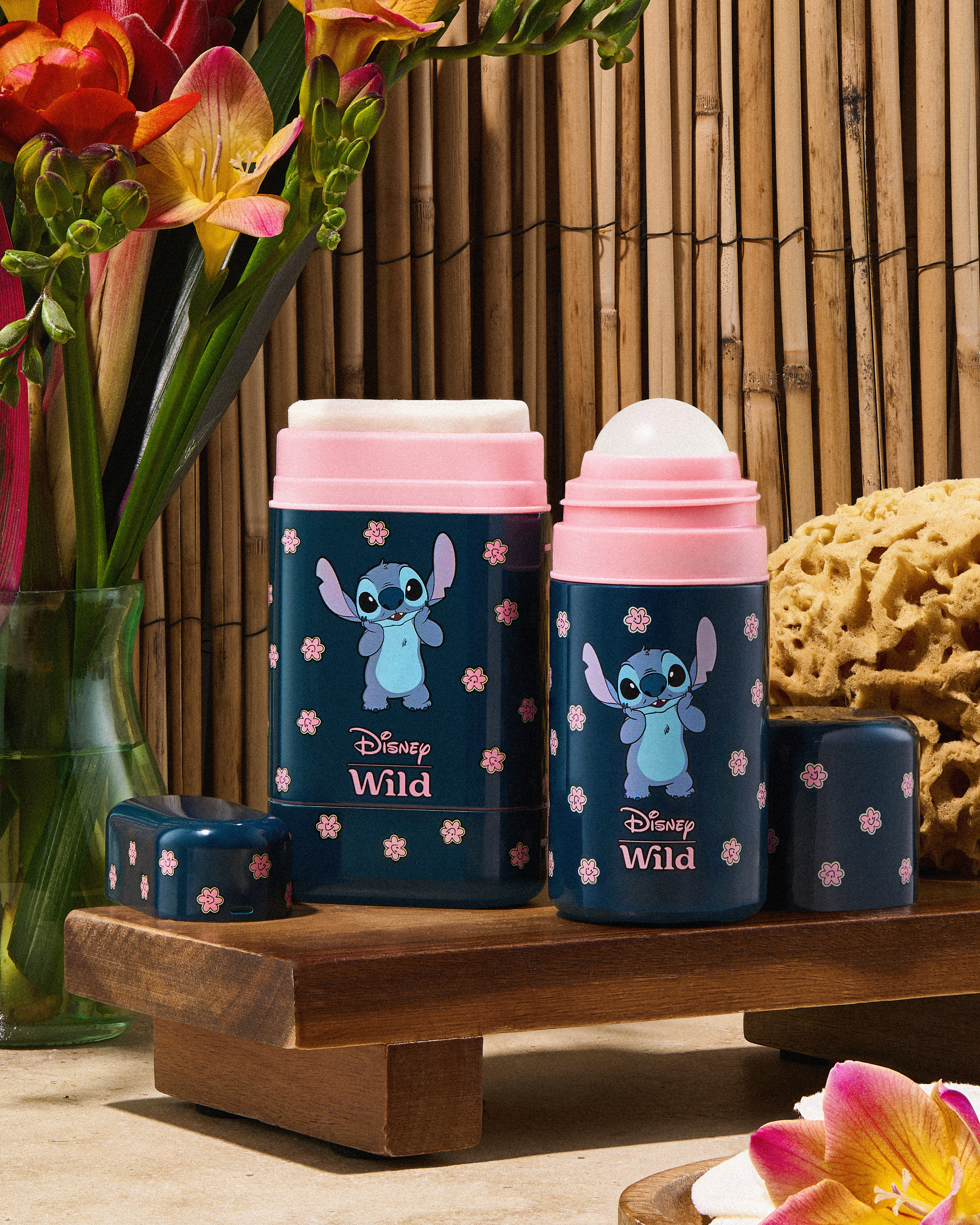 Caption: a couple of blue and pink cups sitting on top of a wooden table