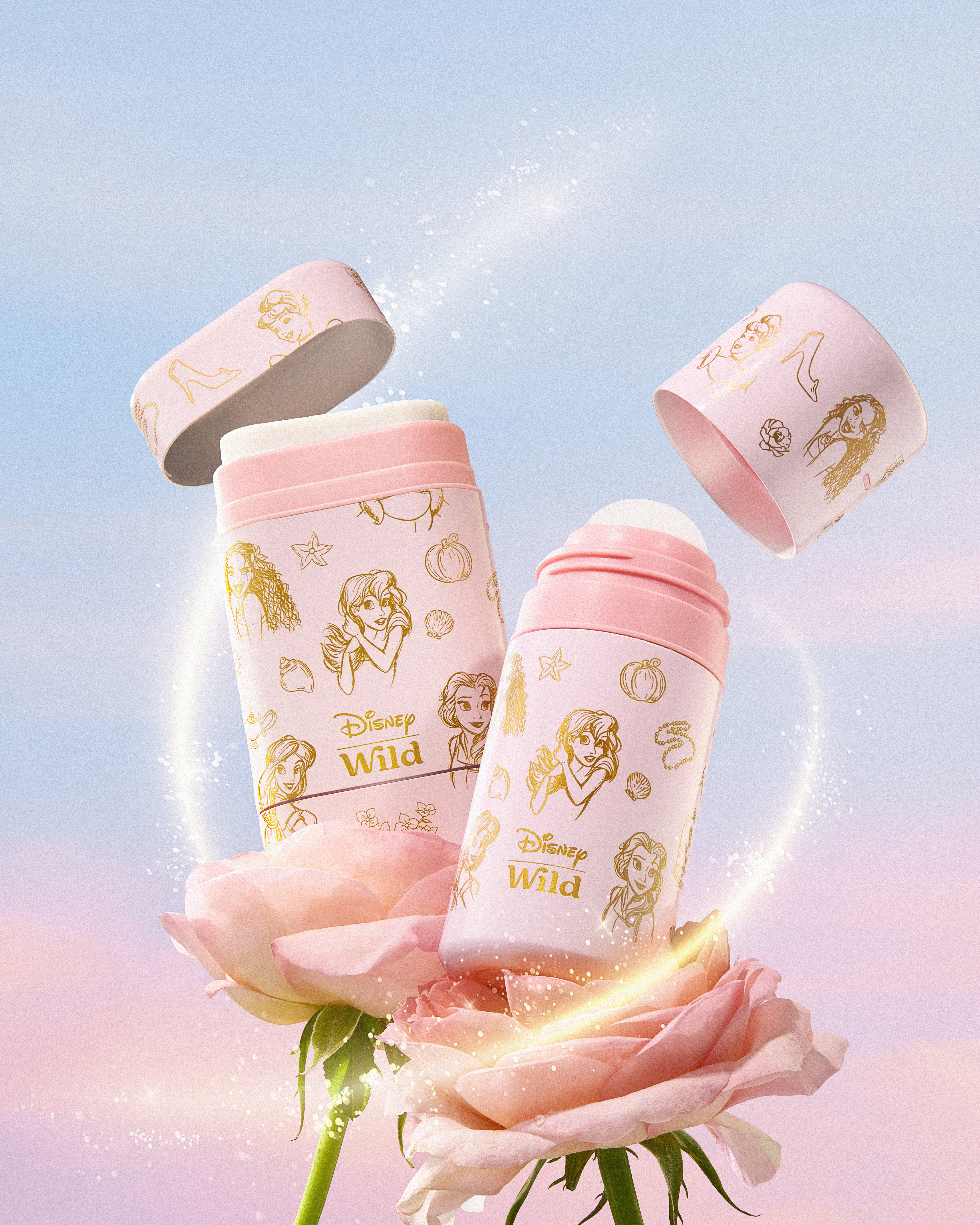 Caption: a pink flower with two pink baby bottles on top of it