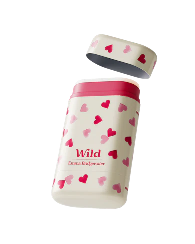 Caption: a white and pink bottle with hearts on it