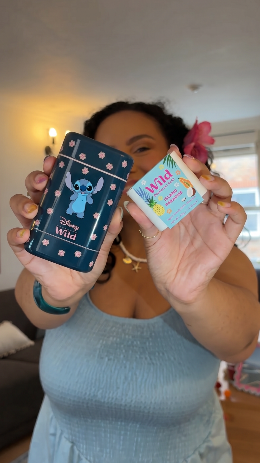 Caption: a woman holding a cell phone in her hands