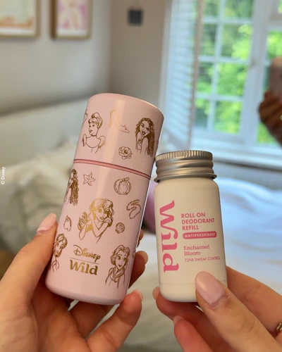 Caption: a person holding a baby bottle and a baby powder
