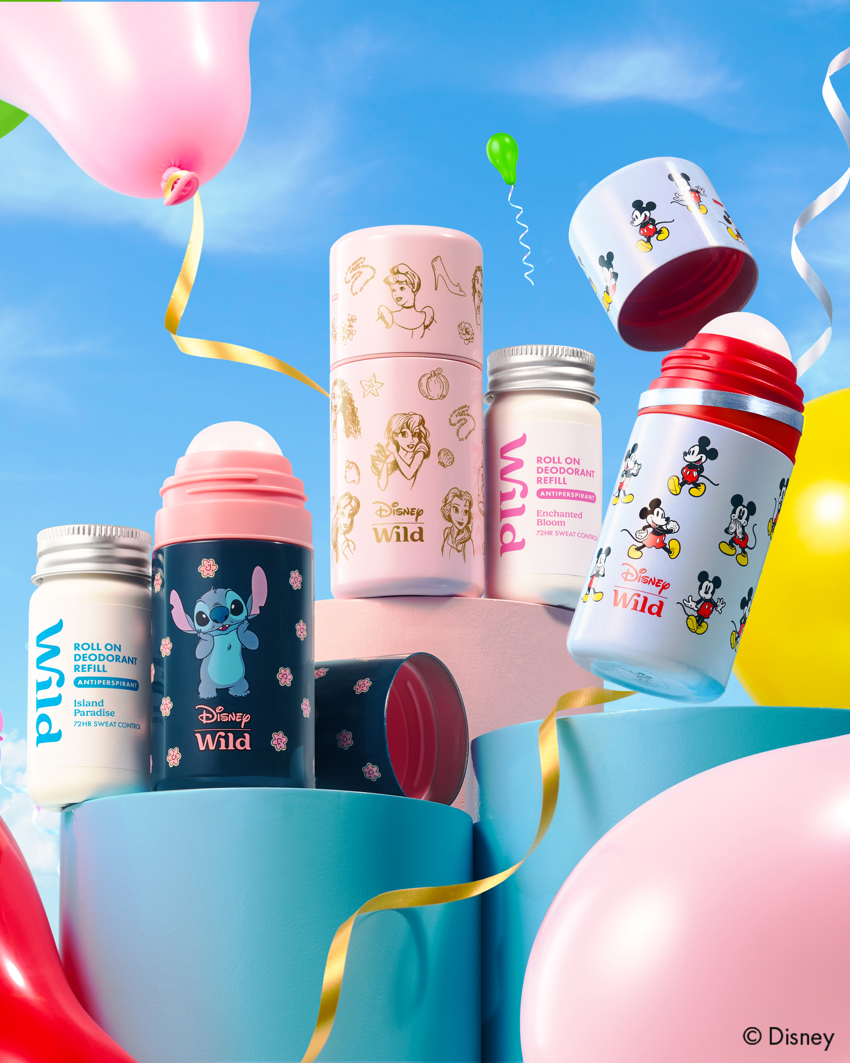 Caption: a group of baby bottles and balloons in the sky