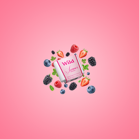 Caption: a pink background with berries, strawberries and a bar of soap