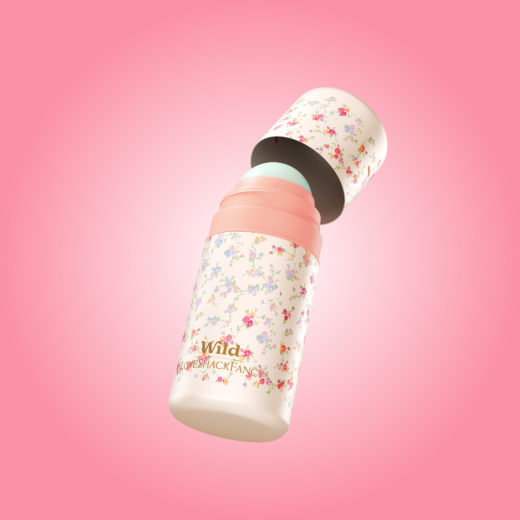 Caption: a pink and white bottle with flowers on it