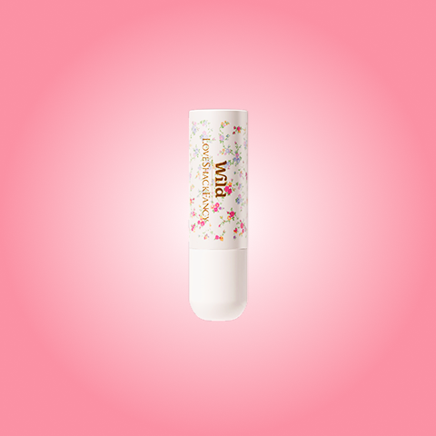 Caption: a tube of lip bale on a pink background