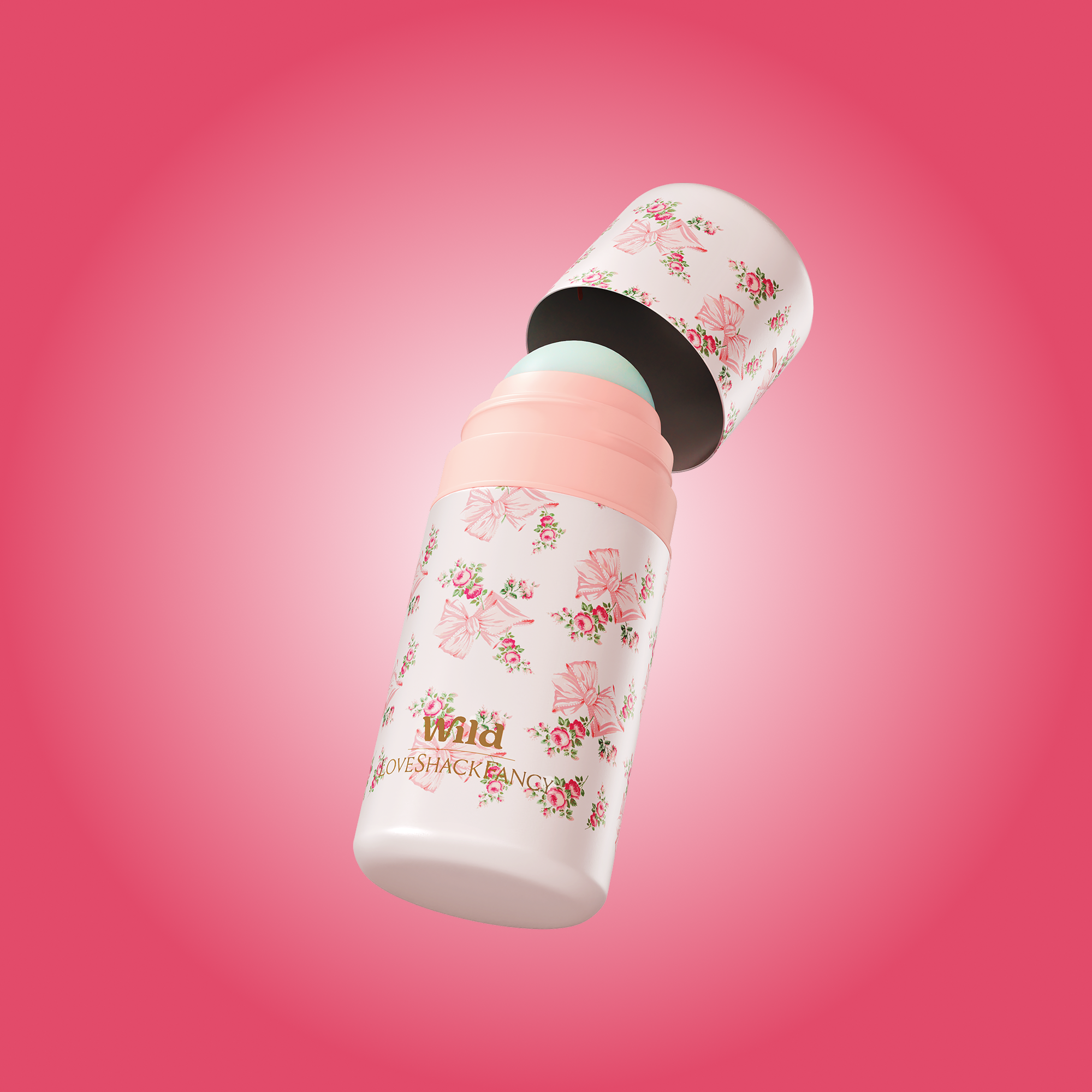 Caption: a pink and white bottle with flowers on it