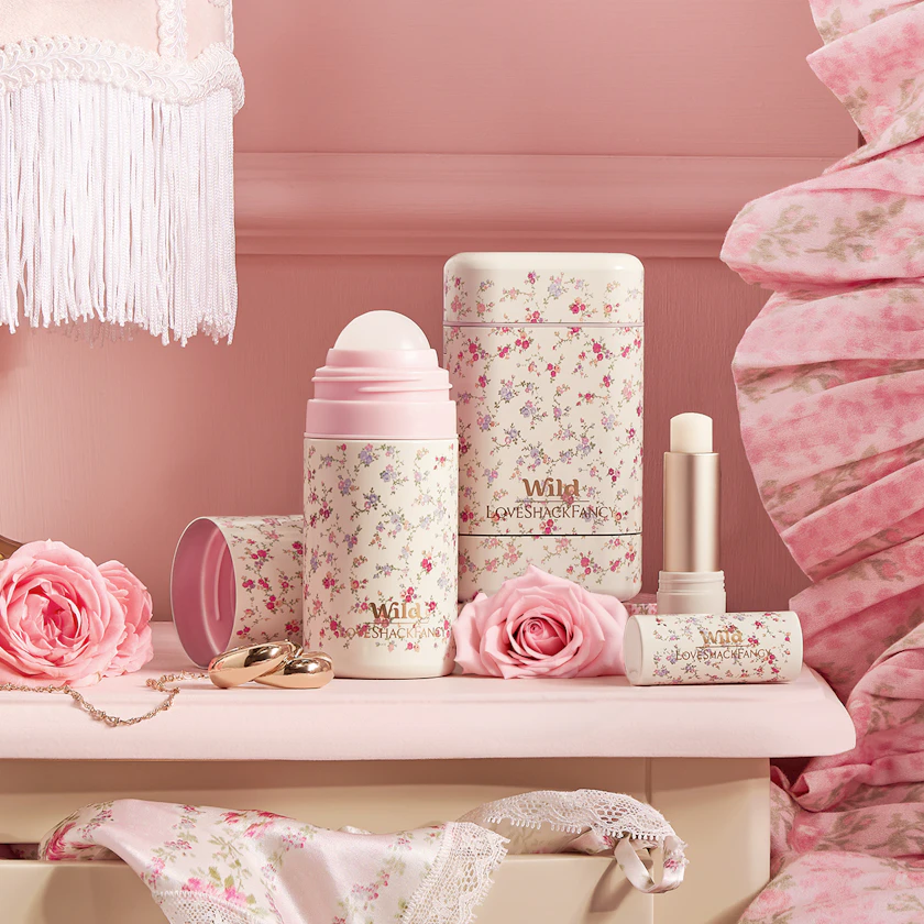 Caption: a pink bedroom with pink flowers and accessories