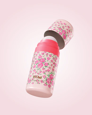 Caption: a pink and white bottle with pink flowers on it