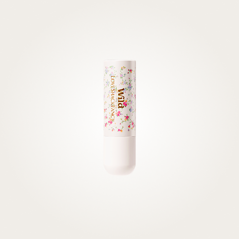Caption: a tube of lip bale with sprinkles on it