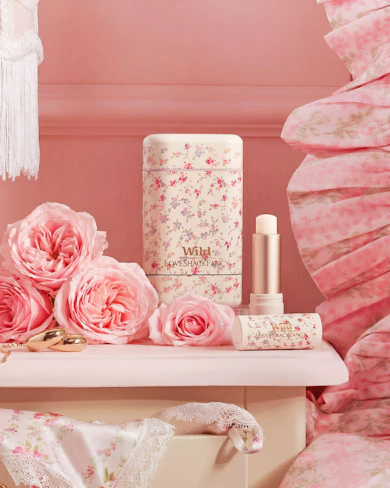 Caption: a pink bedroom with pink flowers and accessories