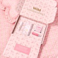 Caption: a pink box with a lot of items inside of it