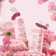 Caption: a pink floral arrangement with a bottle of lip balm